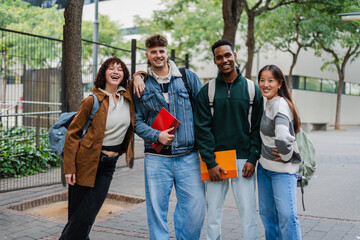 Smiling College Students With Backpacks And Books At Campus