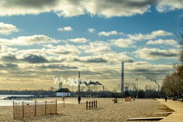 Gas fired electricity generators in the Toronto Port Lands sending vapour into very cold air  shot...