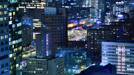 Aerial photography of modern architectural landscapes at night. Lights in the windows of buildings....