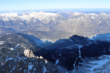 Obraz premium Shadow of Zugspitze over surrounding mountains