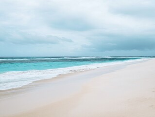 Fototapeta premium Serene ocean waves gently lapping a pristine sandy beach