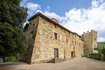 Obraz premium the exterior of the ancient Benedictine abbey of San Michele in Sant'Arcangelo on Lake Trasimeno medieval building from the 11th century 