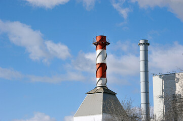 boiler room pipe on the background of blue sky