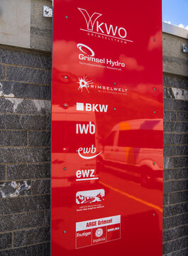 Grimselpass, Switzerland - August 8, 2024: List of construction companies involved in the renovation of the Grimselpasssee dam