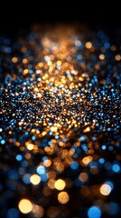 Fototapeta premium Abstract gold and blue glitter bokeh background.