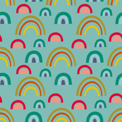 Fototapeta premium Colorful rainbows seamless pattern, vector background. Ideal for fabric, textile, baby bedding, wallpaper, pajamas. Scandinavian style.