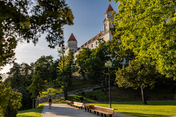 Walking woman in the garden underneath Castle Bratislava, Bratislava, Slovakia