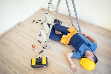 Accident at work prevention concept, worker after job injury