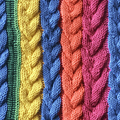 Rainbow colored cable knit sweater pattern - seamless tile