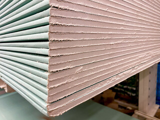 This highquality image provides a detailed and closeup view of a taller stack of essential drywall...