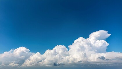 white fluffy clouds in the blue sky