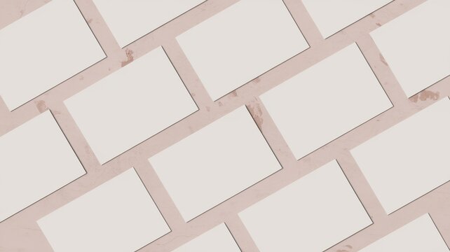 A collection of blank frames arranged in a diagonal pattern on a soft pink background, creating a modern and artistic layout.