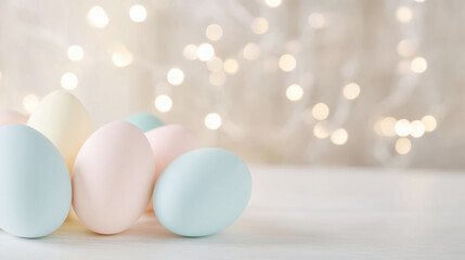 Fototapeta premium Serene pastel easter eggs arrangement on table with soft fairy lights