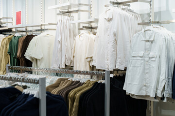 Clothing displays showcase a variety of styles in a vibrant retail space