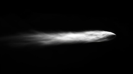Dramatic close-up of a sleek, aerodynamic object in motion against a dark background.