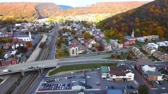 ancient city of Cumberland in Maryland. Autumn colors of the hills. Cumberland Railroad and Churches.