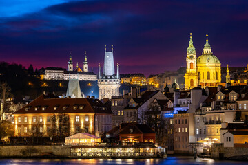 Obraz premium Blue hour after a fiery sunset over historic Prague - Lesser Town and St. Nicholas Church