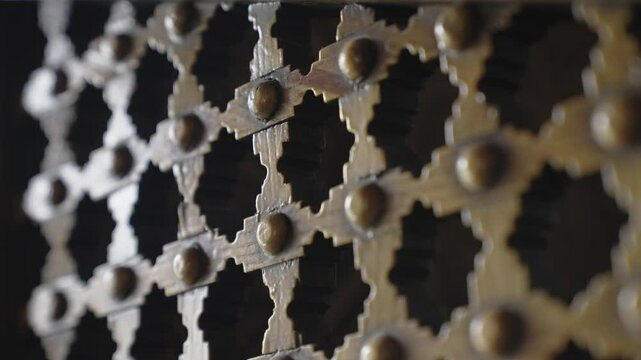 A detailed view of the impressive woodwork of the Valide-i Atik Mosque. This video, shot with a camera slider, reveals the finesse of wood carving and the beauty of geometric patterns.