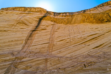 Upward view of a steep sandstone canyon wall at Capitol Reef National Park in Utah, USA