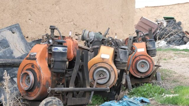 Image of several old Lombardini diesel engines side by side. These engines have typical Lombardini features and are used in agriculture, construction or gardening.