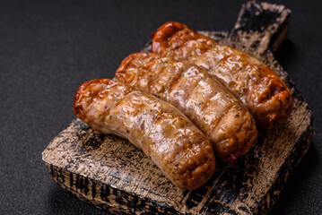Juicy chicken or pork sausages with salt and spices