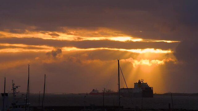 Large freight ferry voyaging into the sunset