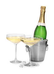 Champagne and bucket with ice isolated on white