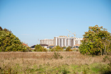 A building with a grassy field