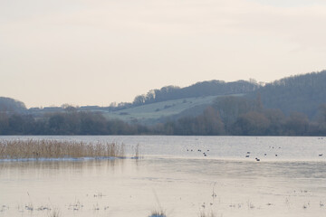 Lake and distant frost covered hills