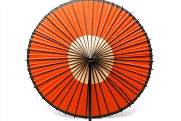 Summer party and drinking glass decoration concept featuring a picture of a colorful orange cocktail paper decorative umbrella, isolated on a white background with a clipping path cutout