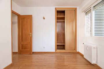 Organizing a built-in closet efficiently is key to keeping your bedroom organized