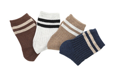 Pairs of folded soft socks isolated on white, top view