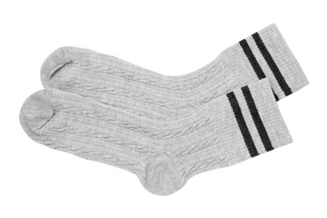 Pair of soft socks isolated on white, top view
