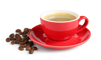 Red cup with coffee and roasted beans isolated on white