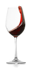 Red wine splashing in glass on white background