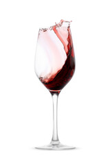 Red wine splashing in glass on white background