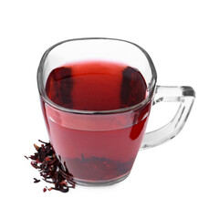 Delicious hibiscus tea in glass cup and dry roselle sepals isolated on white