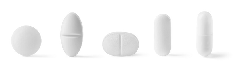 Different pills in row isolated on white, set