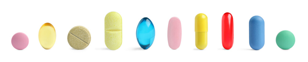 Different pills in row isolated on white, set