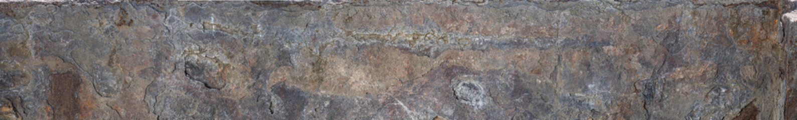 Ecos de Construcciones Antiguas: Piedra Exterior con Detalles Oxidados y Textura Rústica Intemporal Panorama