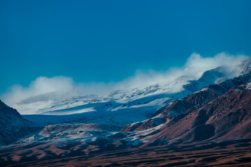 Mountains winter Kyrgyzstan landscape with snowy peaks