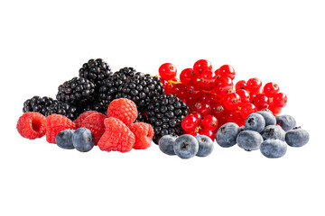 A pile of various ripe berries in large quantities on a white background