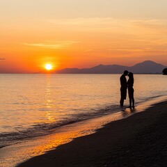 Fototapeta premium Silhouette Couple Kissing at Sunset Beach