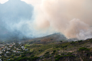 Helicopters trying to contain the fire at the foot of the Table Mountain, Cape Town, South Africa