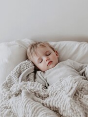 Peaceful sleep of a caucasian young child in cozy blankets