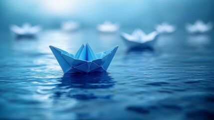 Blue origami paper boats floating on water.