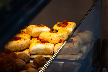 a street food stall where freshly prepared spicy stinky tofu is on display