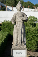 Obraz premium Stone statue Lisura the virgin sign belonging to the episcopal garden of the city of Castelo Branco-Portugal.