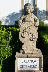 Fototapeta premium Stone statue depicting the scale sign belonging to the episcopal garden of the city of Castelo Branco