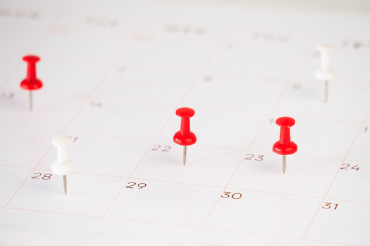 background of calendar and push pin stack on it - Powered by Adobe